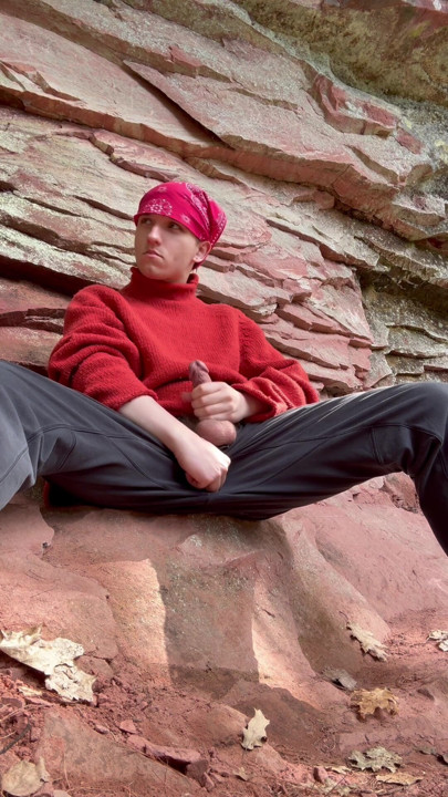 College boy plays with his hard cock on a hiking trail