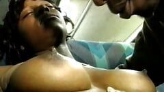 Black stud gets his huge cock sucked by ebony slut on the back seat of a bus