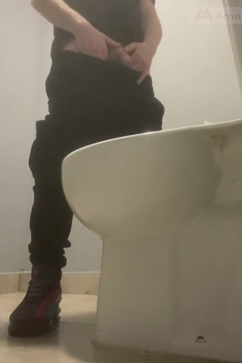 Amateur Friends Pissing Together in the Club's Toilets