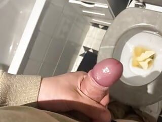 An 18-year-old masturbates in his toilet while he prepares food.