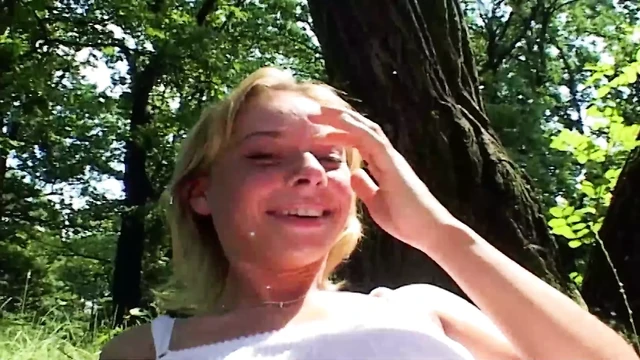 Sweet German teen pleasing her tight pussy in the woods