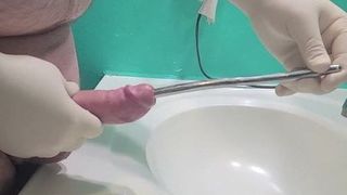 Urethral Sounding in Surgical Gloves