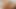 ストラポンズ・ガールズのシーン1_a美しいブルネットのレズビアンカップルがストラップオンでセックスを楽しんでいます。