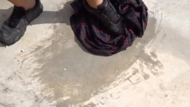 trample on red tartan skirt