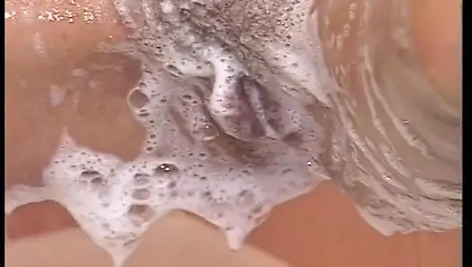 Hairy MILF slut masturbates under shower