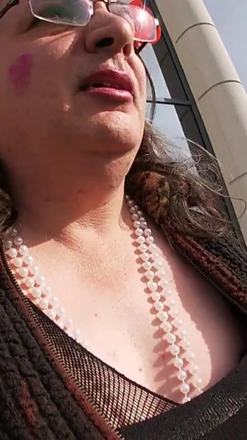 Emotional moment from "Dirty sexy Sissy Crossdresser Is showing of in the carpark near the highway"
