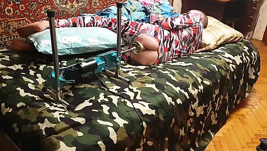 Sasha Earth in an erotic costume having sex with a fuck machine homemade