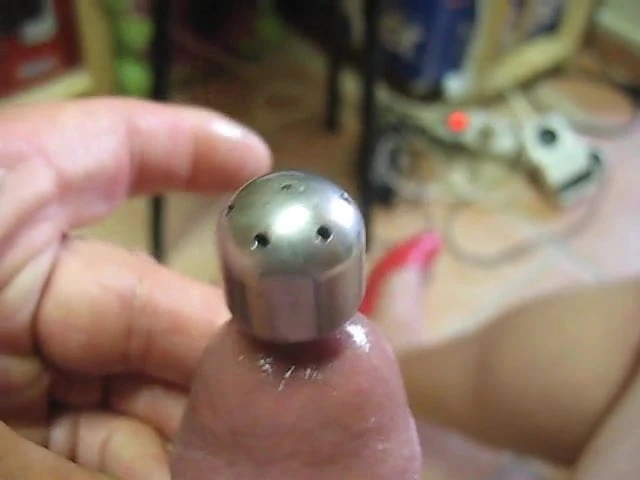 Wanking with hollow plug 001