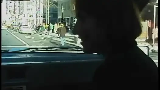 Commuter redhead carpools with creep who debases her in car in city traffic