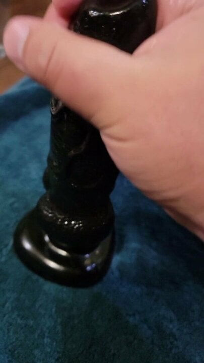 Dildo handjob