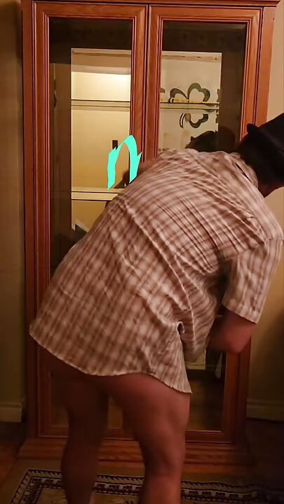 Twink Bubble Butt cleans cabinet