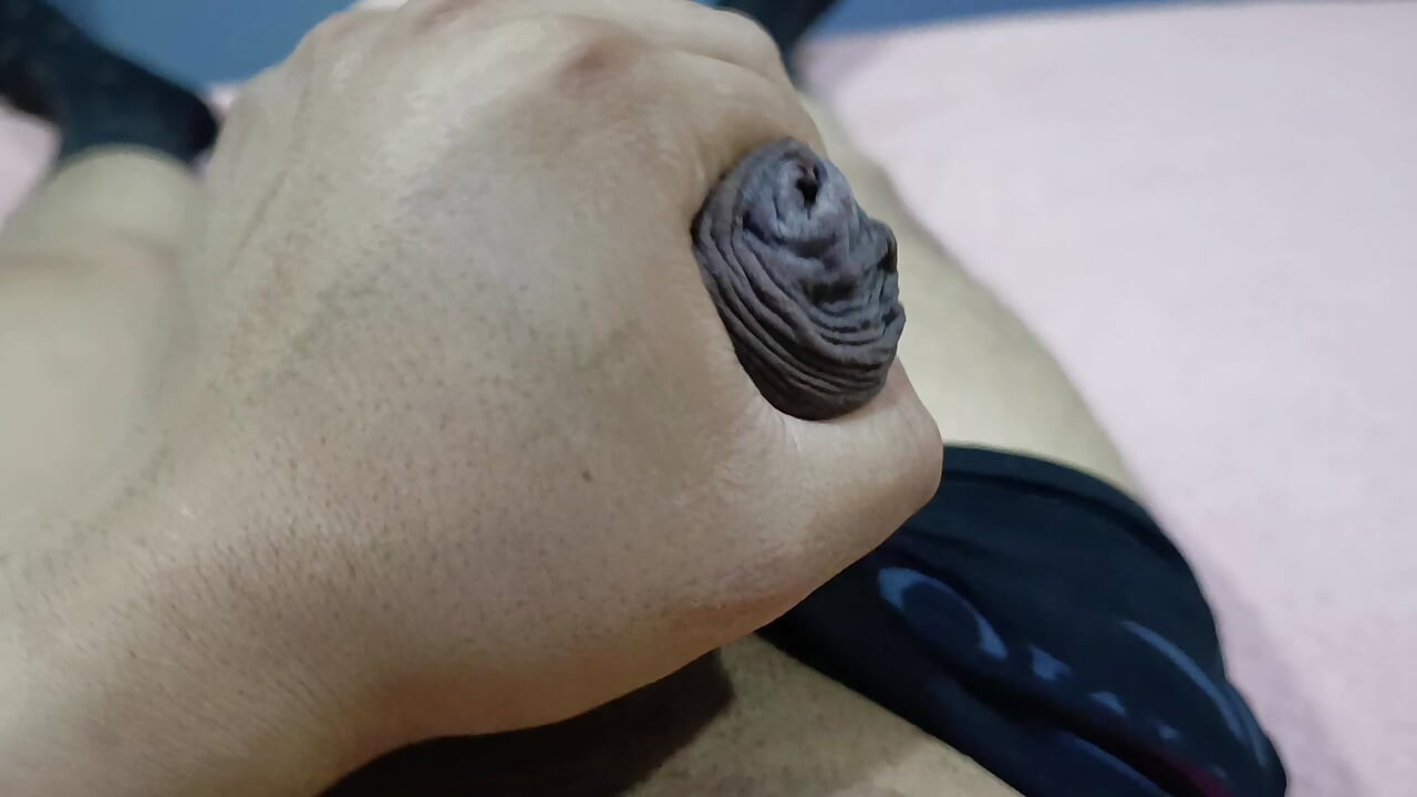 I massage my big cock on the hotel bed at night to really relax.