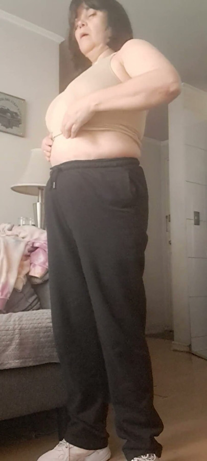 MILF Taking off Her Clothes and Stripping Down to Her Panties