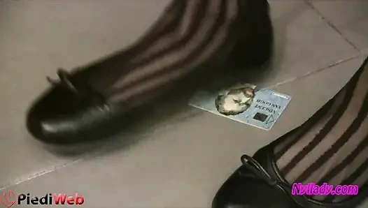 Nyllady Footplaying with a Phone Card in Patent Black Stockings
