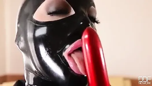 latex girl with big tits suck and fuck red dildo
