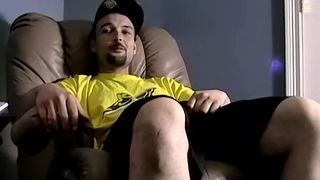 Bearded amateur plays with his dick and cums on himself