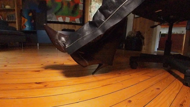 Leather chaps and pointy boots
