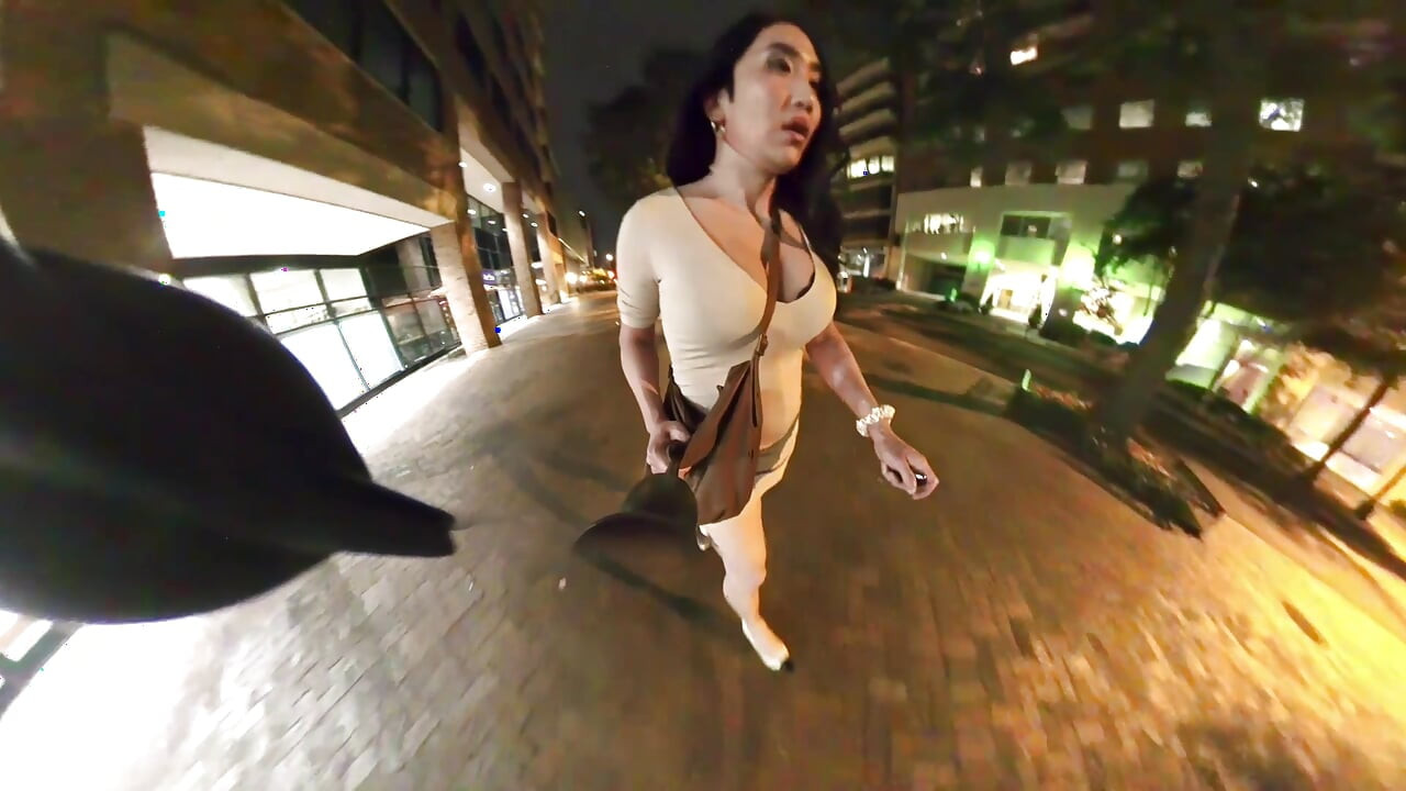 Kelly goes for a walk downtown in a tight slutty dress