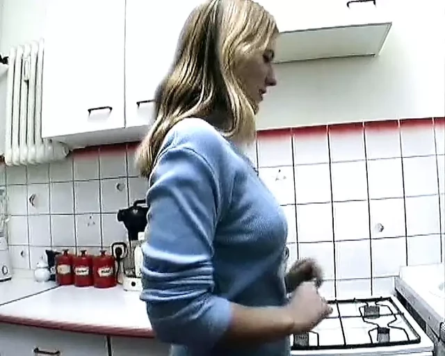 Superb German babe having fun with her kitchen tools