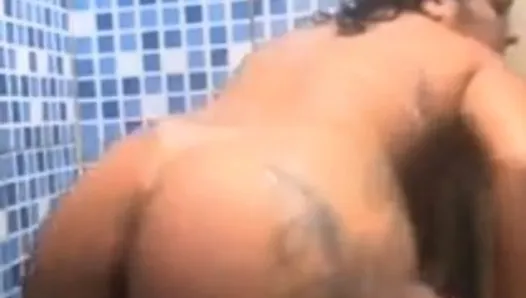 hot wife showing off in the bathroom, dancing and shaking her big hot ass, showing her body the color of sin with that l