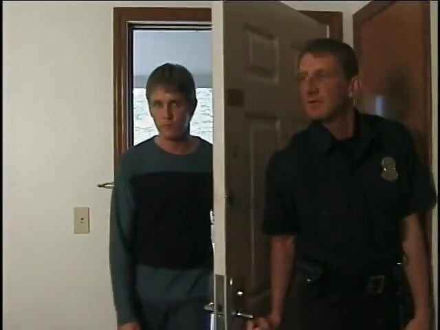 Two smooching male cops sucking dick