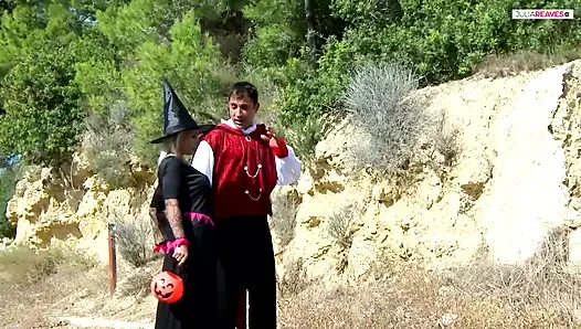 Big tits MILF sucks a huge cock while another thrusts her pussy in the wild