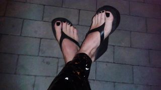 flip flops and latex pants