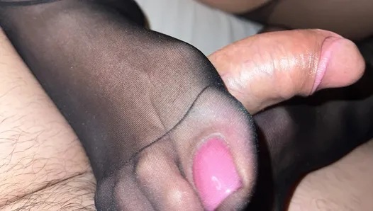 My wife gives me a footjob and then squirts on my cock