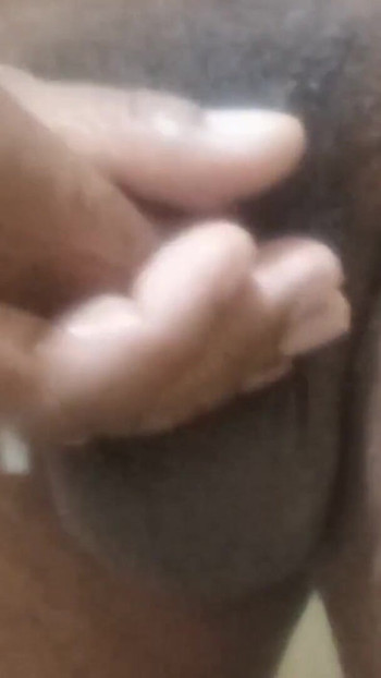 Key moment from "Young boy takes out siman of boy shaking penish in school bathroom."