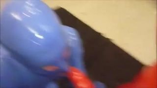 rubber guy sucking his friend