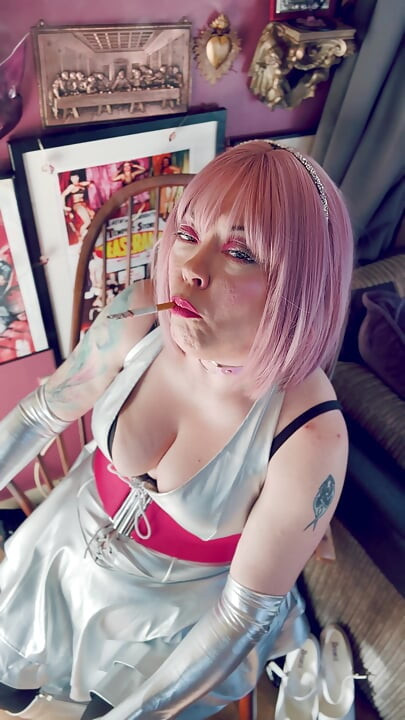 Barbarella Tribute! Tina Snua Dressed In Silver Including Knee High Boots & Gloves Smokes 2 Cigarettes Tip To Tail