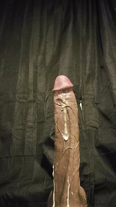 Sissy rides huge bbc dildo close up.