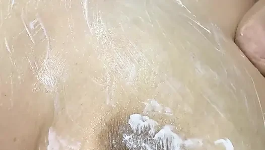 Mom vibrates her big tits with her big vibrator