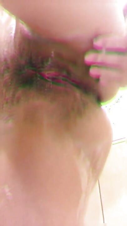 MILF Caresses Her Wet Vagina in the Bathroom