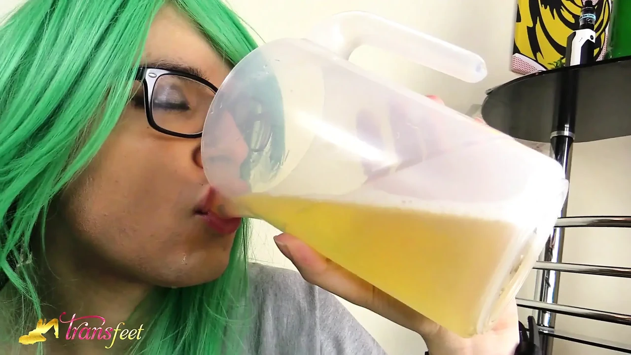 Transexual girl pissing and dringking own pee