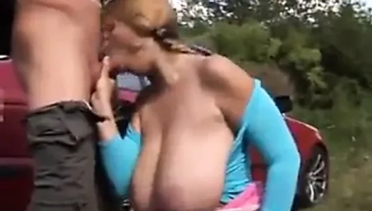 Pigtailed girl with huge tits outdoor