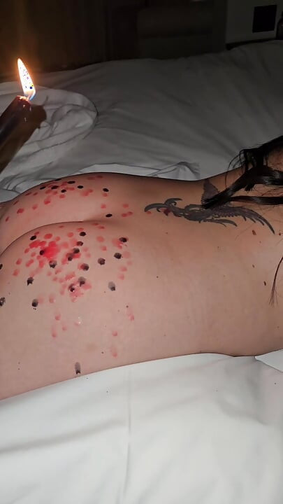 He drips wax on my ass and then cums on my pussy to cool me off!