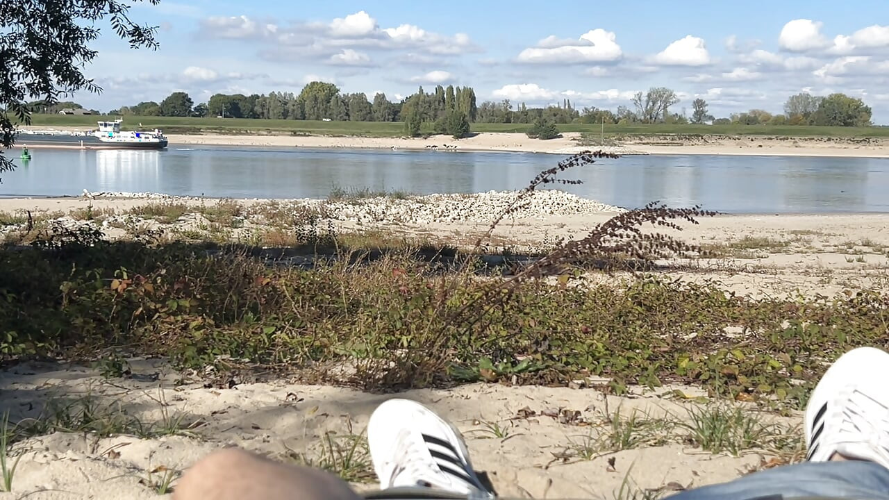 Flaccid penis next to the water