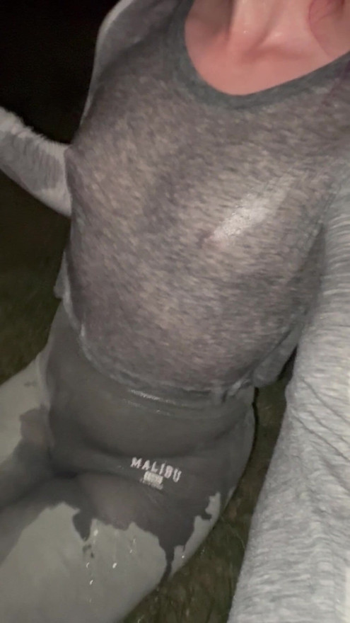 Unsupervised Cutie soaks her grey outfit with no bra but thigh high stocking inter leggings