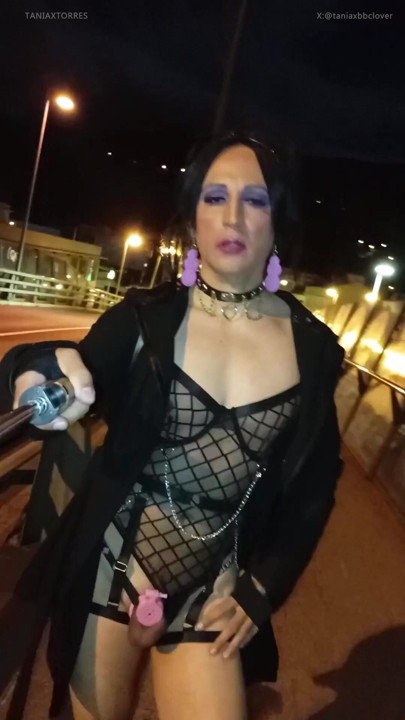 Taniax walks around the city in sexy black lingerie,showing her tiny cock in flat chastity cage | Clip 1