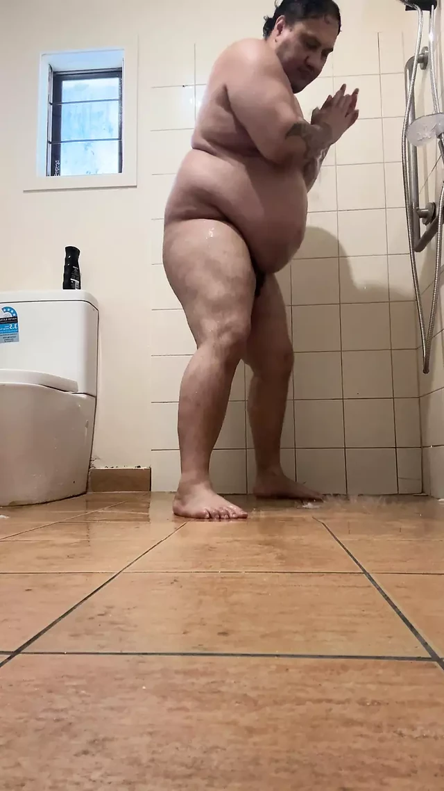 Public shower showing