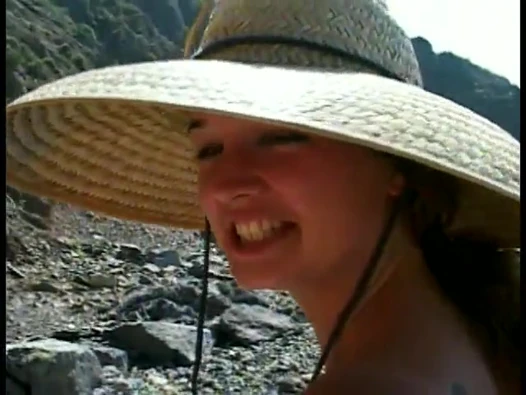 Curly-Haired teen sucks older guy's cock at the beach then fucks