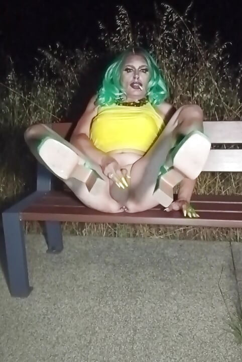 Sexy mature transvestite slut party summer showing off in a public park