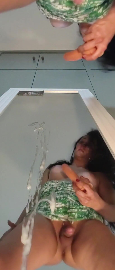 Spectacular moment from "Transvestite masturbating in front of the mirror with the dildo inside her ass, she comes a lot"