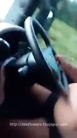 Kerla girl riding boyfriend in running car