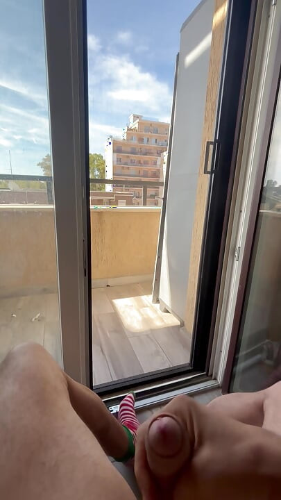 Too horny I cummed from the balcony almost caught by the neighbors