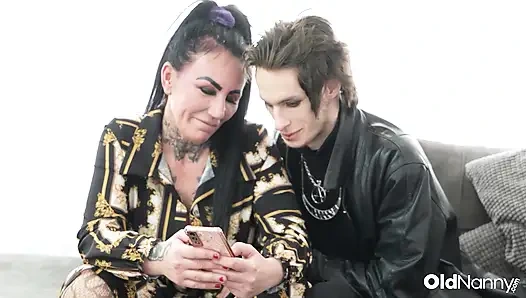 Inked Mature With Big Tits Gives Blowjob To Emo Stud