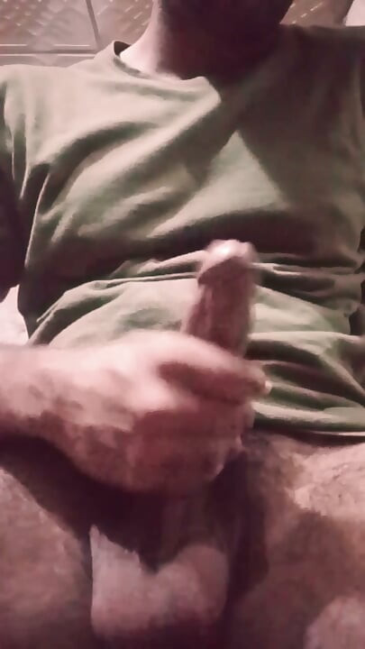 Solo guy masturbating and playing with his dick