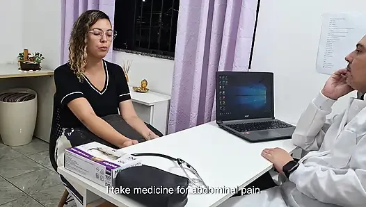 Medical examination of the patient's abdomen in the doctor's office.
