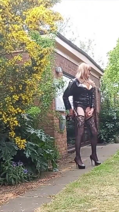 Emotional moment from "Crossdressing Gina Cumming in Panties Outdoors"